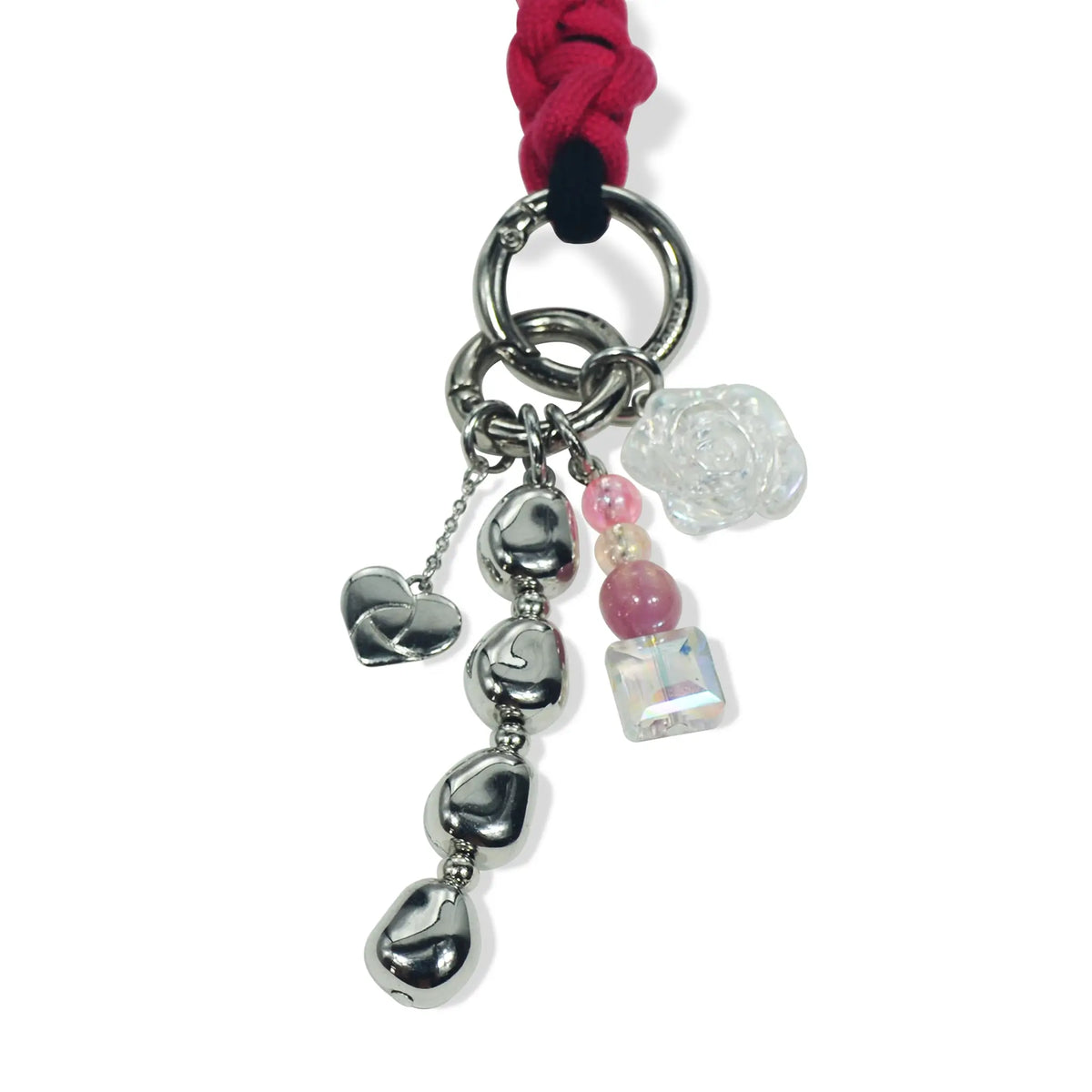 Close-up of charm elements and clasp on Rhea handle