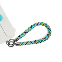 Patagonia wrist strap secured to phone case with strap card